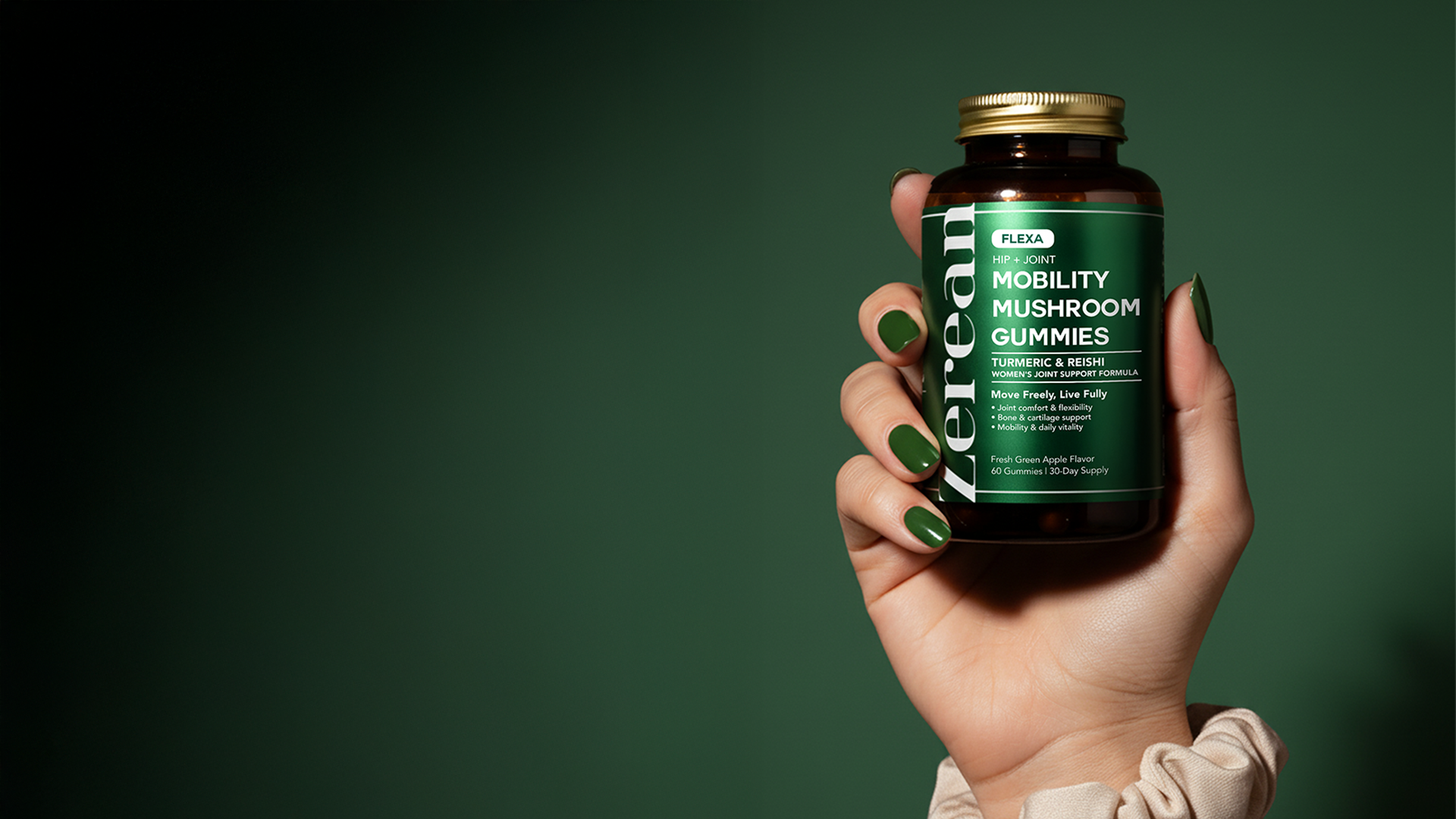 Hand holding Zerean Flexa Mobility Mushroom Gummies bottle — clinically proven joint and bone support with turmeric and reishi for flexibility.