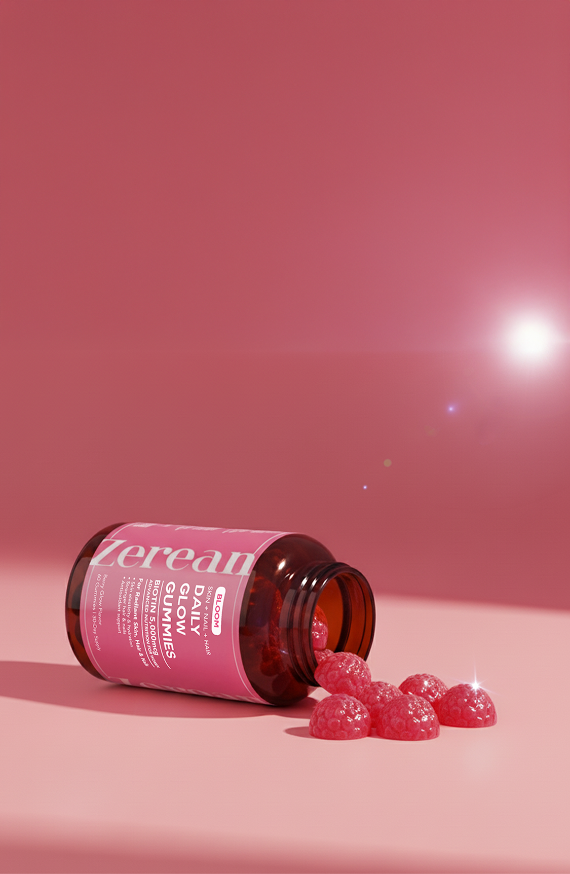Zerean Bloom Daily Glow Gummies bottle with pink gummies — science-backed biotin, vitamin C, and E formula for radiant skin, hair, and nails.